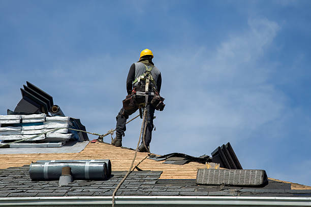 Professional Roof Replacement technician working in Arvin, CA